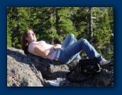 Lonna resting on rocks
